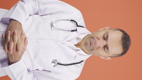 Vertical-video-of-Emotional-and-tearful-doctor.